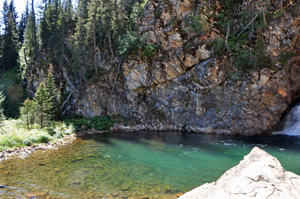 the water at the bottom of the falls