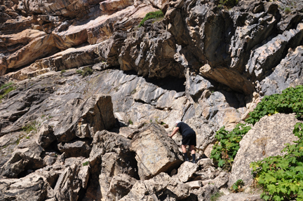 Lee climbing the rocks