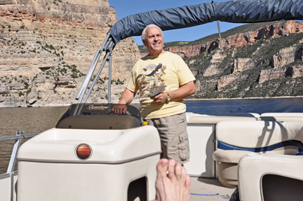 Lee really enjoying Bighorn Lake and cliffs