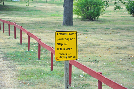 leaving the park sign