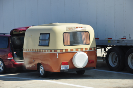 a cute RV that says "THINK BIG" on the back