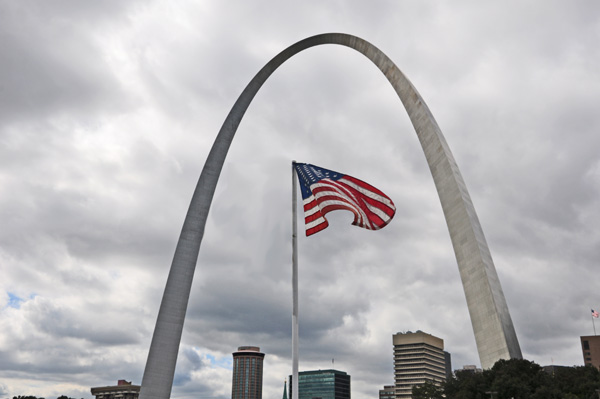 Gateway Arch and USA flag