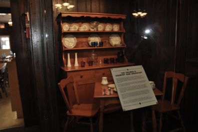 hutch, table, and chairs