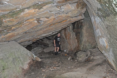 Lee Duquette in a boulder cave