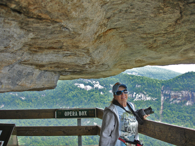 Karen is covered by a rock overhang