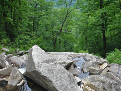 rocks at the bottom of the falls