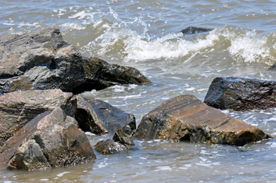 waves breaking over the rocks 