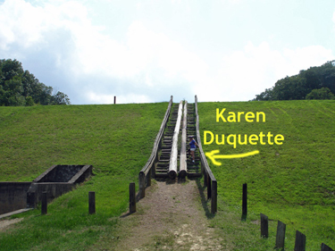 Karen Duquette on the log stairs