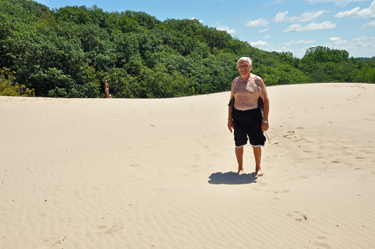 Lee Duquette at the top of the sand dune
