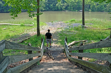 the grandson of the two RV Gypsies heading toward the river