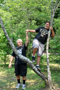 Alex climbing a tree