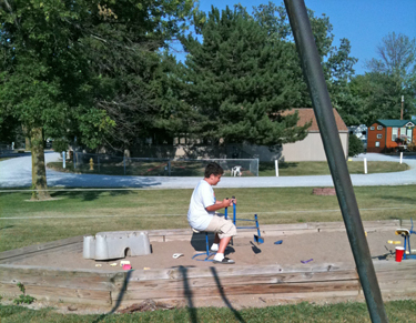 Alex in the playground at KOA