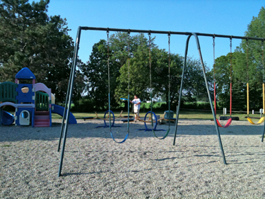 Alex in the playground at KOA