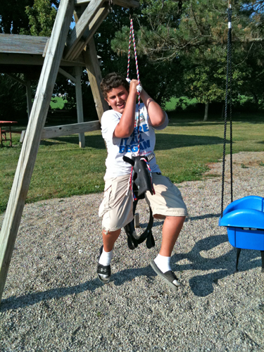 Alex in the playground at KOA