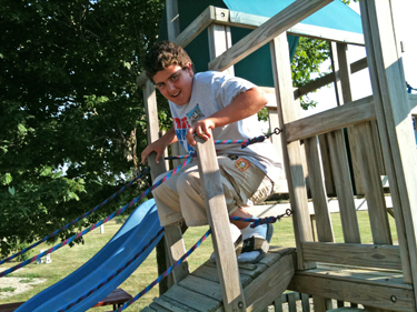 Alex in the playground at KOA