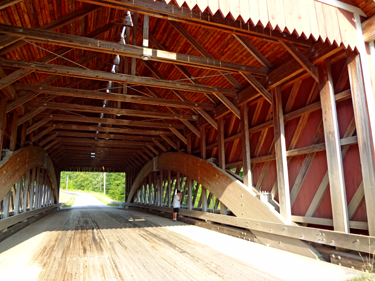 the grandson of the two RV Gypsies inside Netcher Road Covered Bridge in OHIO