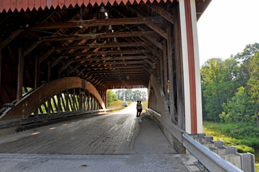 Lee Duquette and Alex inside Netcher Covered Bridge