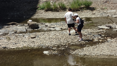 Karen Duquette and Alex under the Smolen - Gulf Covered Bridge