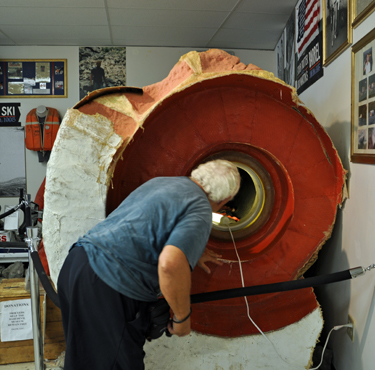 Lee Duquette checks out the barrel