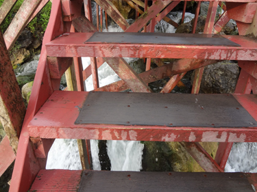 looking through the stairs at the falls