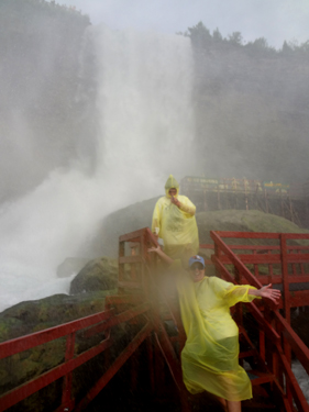 Karen Duquette and her grandson at The grandson of the two RV Gypsies getting soaked