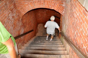 Lee Duquette going down stairs