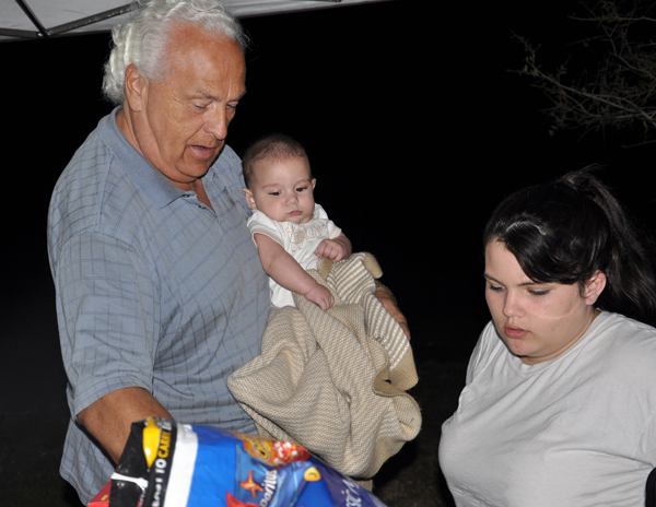 Lee Duquette, his great-grandson and his granddaughter