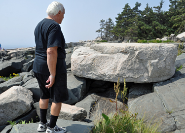 Lee checks out this rock