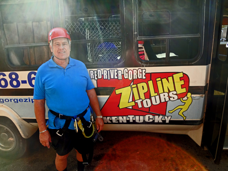 Lee Duquette in front of the shuttle bus