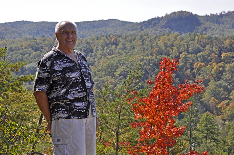 Lee Duquette and a beautiful red tree