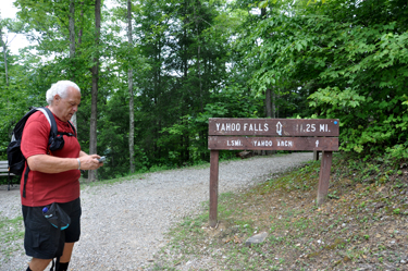 Lee Duquette at the Yahoo Falls sign