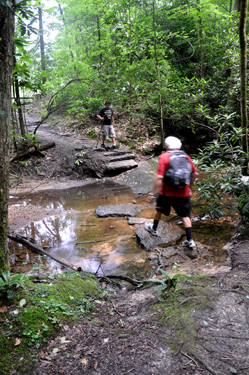 Lee Duquette crossing the stream