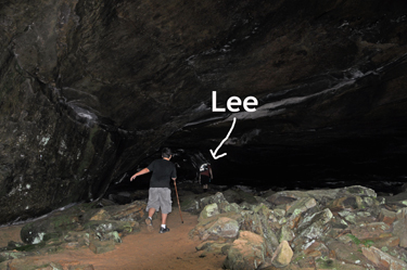 Lee Duquette and Alex under a big boulder by the Yahoo Arch.