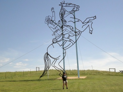 Karen Duquette and Theodore Roosevelt sculpture on the Enchanted Highway