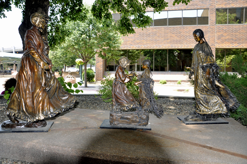 2 daughters share their dolls sculpture