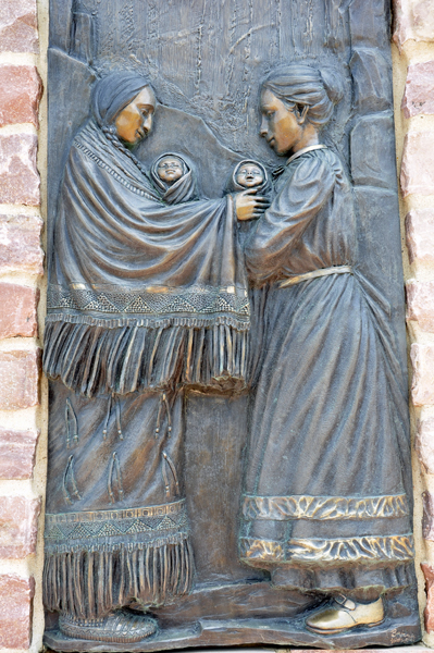 engravings on the side of a bridge