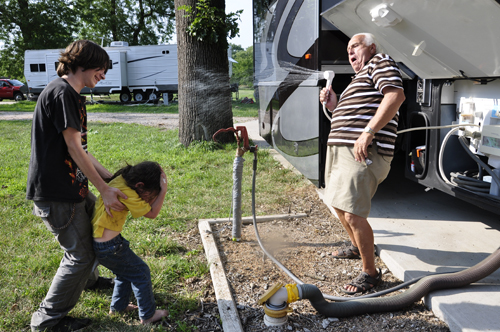 Lee and Jonathan decide to spray Danni with the hose