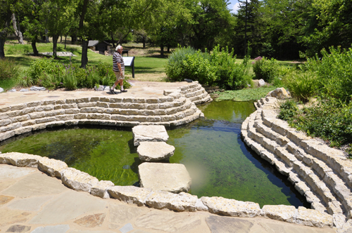 Lee Duquette checking out an overflow of the boiling springs