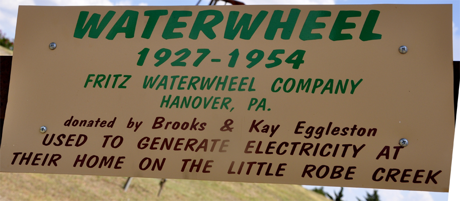 sign about the waterwheel
