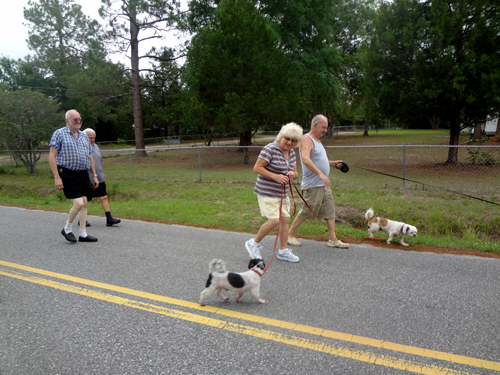 The two RV Gypsies and friends walking to the lake