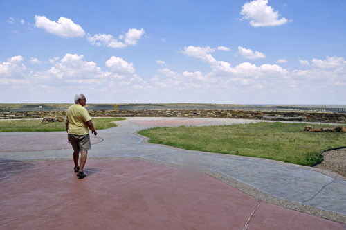 Lee Duquette wanders out the back door of the building to see the Texas landscape