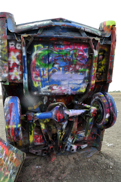 the underside of a caddy at Cadillac Ranch in Texas