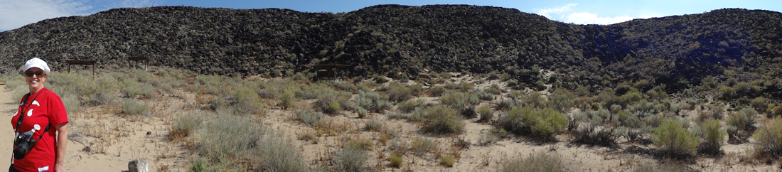 Karen Duquette at the base of the cliff
