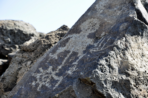 a petroglyphs on a rock atBoca Negra Canyon