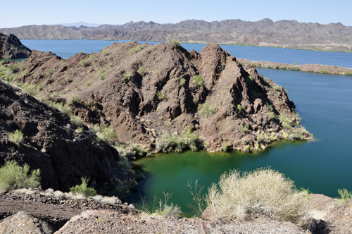 a steep drop down into the waters