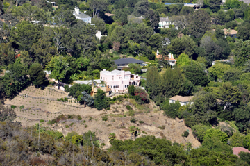 A very large pink house.