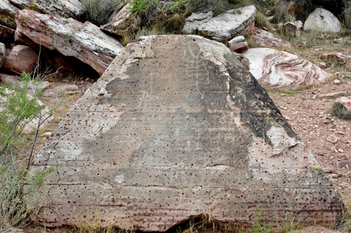 faint petroglyphs on a rock