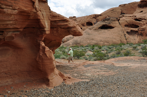 Lee walks around to the back of the Natural Arch