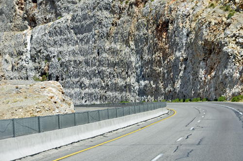 Big mountain cliffs on both sides of the RV of the two RV Gypsies