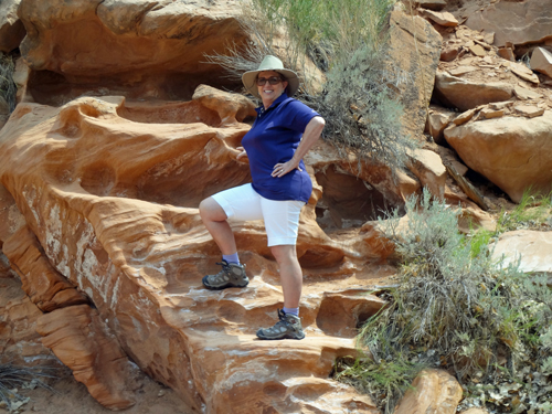 Karen Duquette on a very unique rock